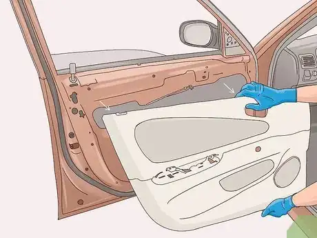 Image titled Remove a Door Panel from a Car Step 12