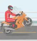 Perform Clutch Wheelies on a Motorcycle