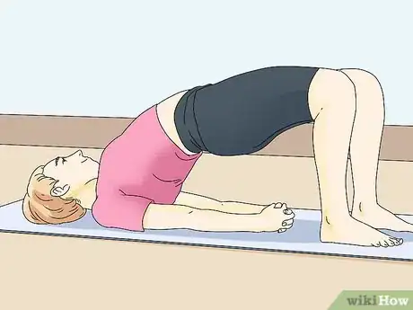 Image titled Do a Back Limber Step 1