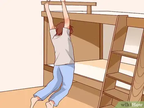 Image titled Get Up to the Top Bunk of a Bunk Bed Step 11