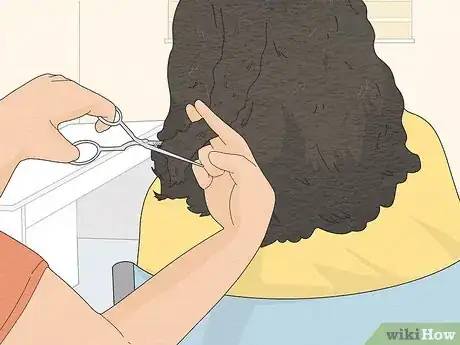 Image titled Take the Bulk Out of Curly Hair Step 11