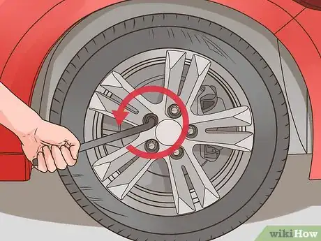 Image titled Change a Tire on a 1999‐2004 Jeep Grand Cherokee (WJ) Step 7