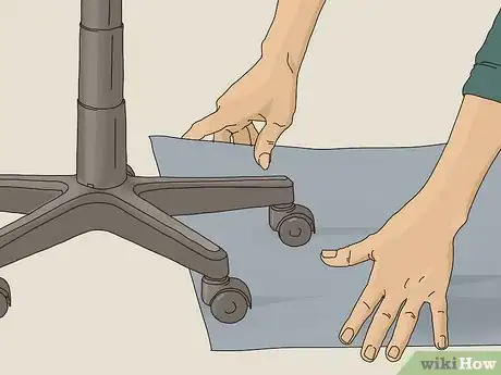 Image titled Clean the Wheels of a Rolling Desk Chair Step 1