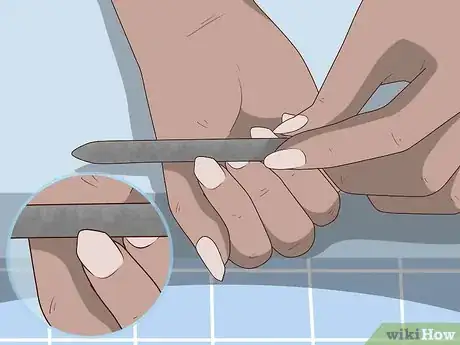 Image titled Play Guitar with Long Nails Step 6.jpeg