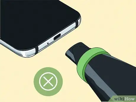 Image titled Get Water Out of Charging Port Step 10