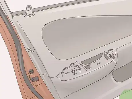 Image titled Remove a Door Panel from a Car Step 10