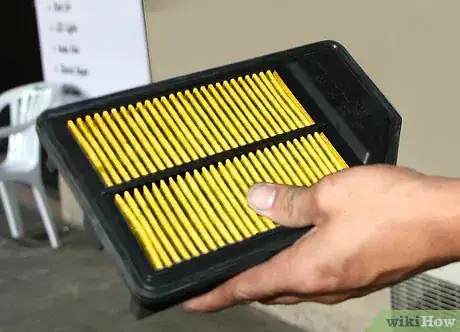 Image titled Change Your Air Filter Step 1