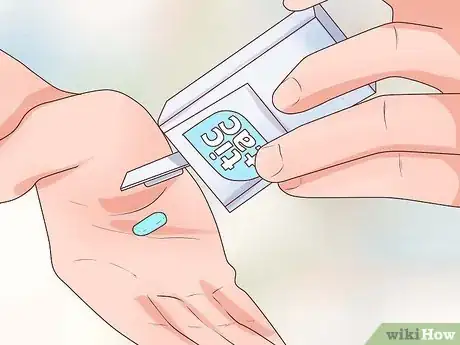 Image titled Eat a Tic Tac Step 1