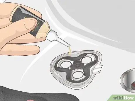 Image titled Apply Oil to an Electric Shaver Step 1