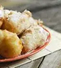 Make Oliebollen (Dutch New Year's Doughnuts)