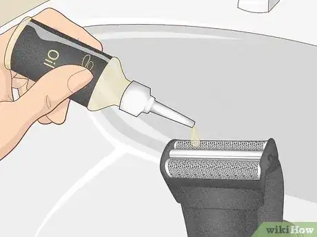 Image titled Apply Oil to an Electric Shaver Step 2