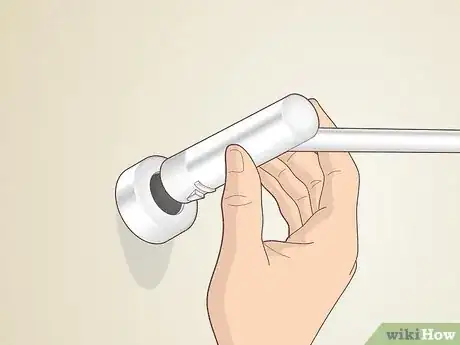 Image titled Remove Towel Bar Step 5