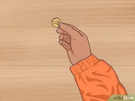 Image titled Make a Coin Disappear Step 14