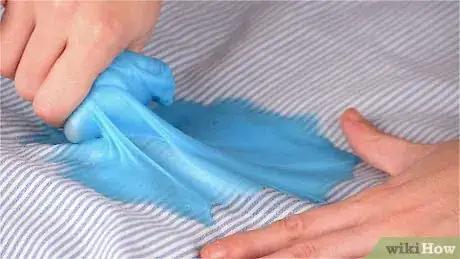 Image titled Remove Slime from Bed Sheets Step 1