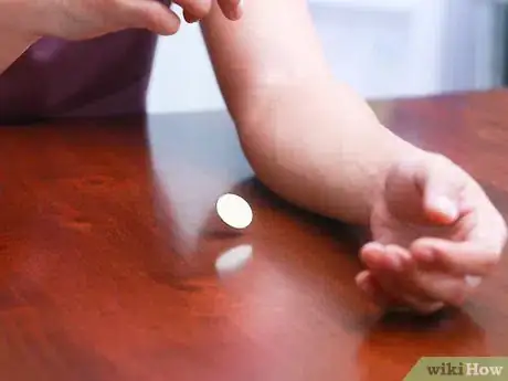 Image titled Do Simple Magic Tricks Step 24