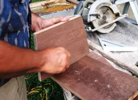 Image titled Tools and lumber on makeshift table