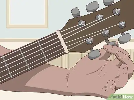 Image titled Play Guitar with Long Nails Step 3.jpeg