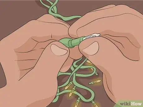 Image titled Fix Christmas Lights That Are Half Out Step 14