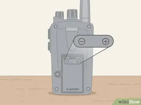 Image titled Put Batteries in Correctly Step 1