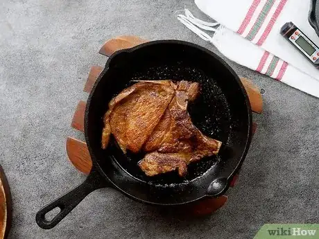 Image titled Tell if Pork Chops Are Done Step 2