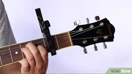 Image titled Capo a Fret on an Acoustic Guitar Step 11