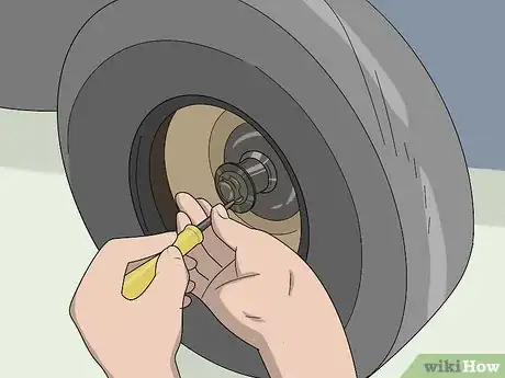 Image titled Remove a Lawn Mower Wheel Step 10