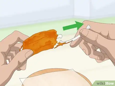 Image titled Eat Chicken Wings Step 5