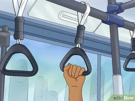 Image titled Remain Standing While Riding a Bus Step 3