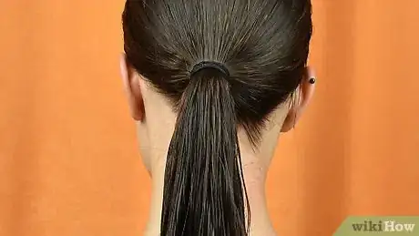 Image titled Do a Slick Bun Step 5