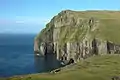 Ásmundarstakkur, a sea stack west of Sandvík.