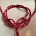 Rose knot on 2 ropes step4 second wall