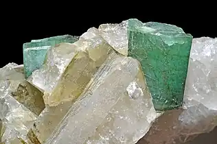 Emerald on quartz, from Carnaiba Mine, Pindobaçu, Campo Formoso ultramafic complex, Bahia, Brazil