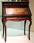 Desk (Art Nouveau), presented at the 1900 Paris Exposition; by Émile Gallé; 1900; molded and carved oak, with chiseled and patinated bronze; height: 108.5 cm; Musée d'Orsay (Paris)