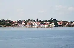 Öregrund seen from a boat moving between Gräsö and Öregrund