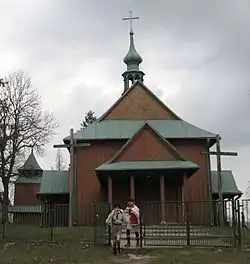 Girl Scouts in front of a Catholic church in Łosiniec