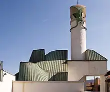 Šerefudin's White Mosque (1980) by Zlatko Ugljen in Visoko references traditional Bosnian mosque architecture