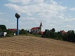 Water tower and the Church of Saints Simon and Jude