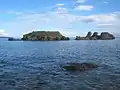 Pigeon rocks from the shore.