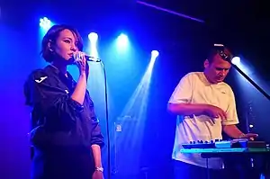 Aigel Gaisina (left) and Ilya Baramiya (right) performing at 16 Tons, Moscow, in August 2019