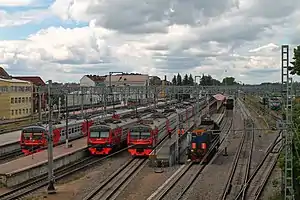 Suburban trains on the platforms.