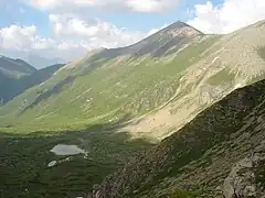 View of Titov Vrv, with Lake Krivošijsko in the foothills