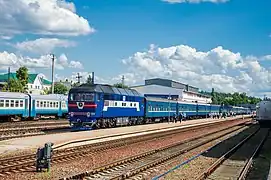 TEP70-0148 with a passenger train at Smorodine station