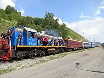 Train surfing on a diesel locomotive at Circum-Baikal Railway, Russia