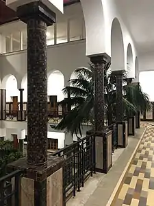 Zellige-covered columns in the arcade surrounding the ṣuḥoon.