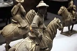 Figure of a Mongol man wearing Mongol attire and a boli hat, Yuan dynasty.