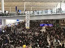 Liberate Hong Kong banner inside Hong Kong airport, 2019