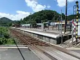 Crossing in front of station