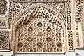 Stucco decoration in the courtyard, including muqarnas sculpting