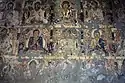 Buddha paintings in the side aisle of Cave 19