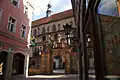 Church and Baroque gate seen from an Old Town street